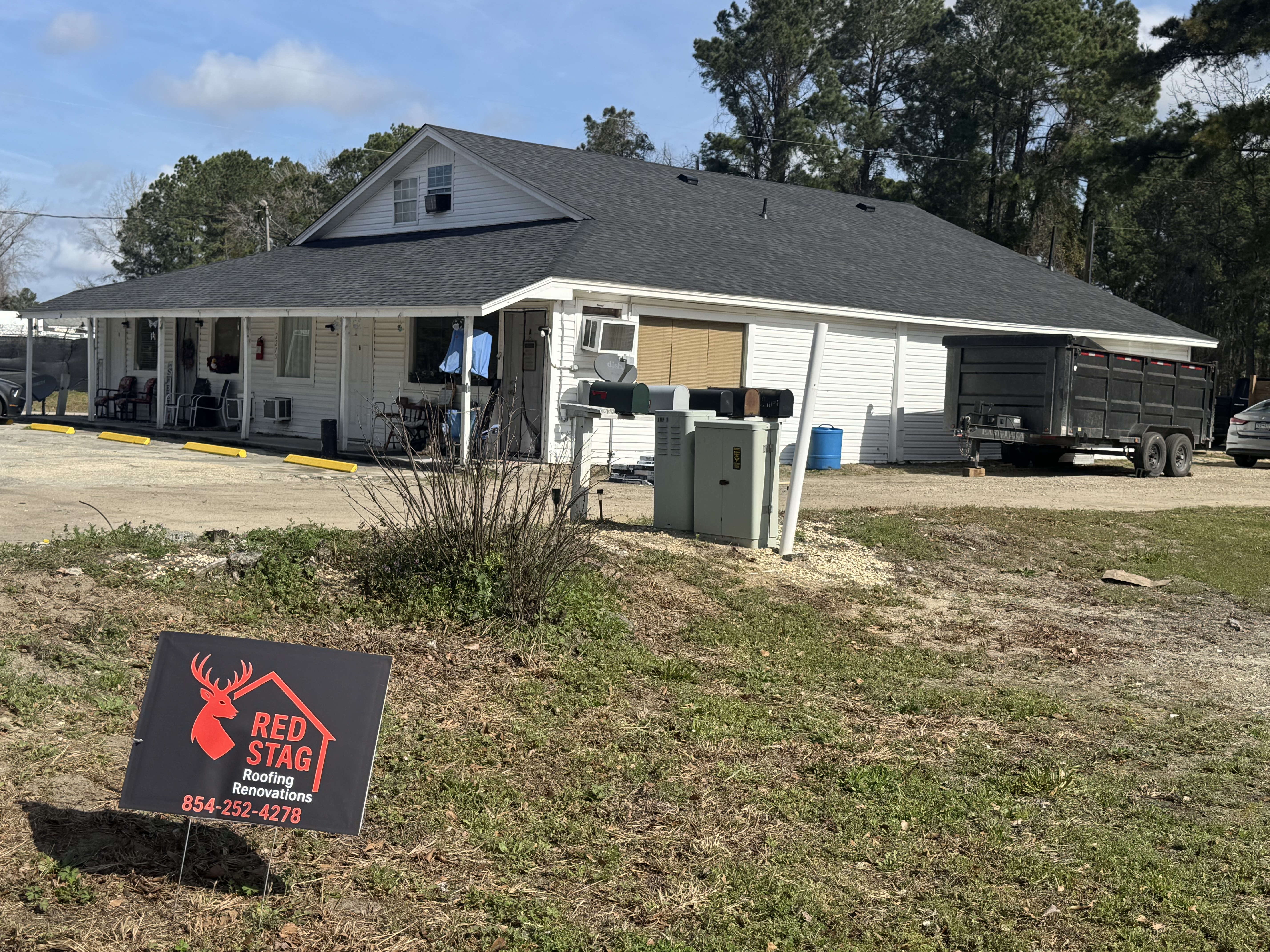Completed roof with Red Stag yard sign